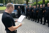 Policjanci podczas odprawy przed wyjazdem na ŚDM