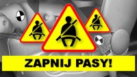 znak ostrzegawczy koloru żółtego z napisem zapinaj pasy