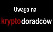 napis &quot;uwaga na kryptodoradców&quot; na czarnym tle