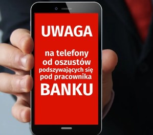 grafika-telefon komórkowy, napis na czerwonym tle, uwaga na telefony oszustów podszywających się pod pracowników banku