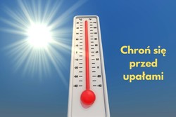 termometr, w tle słońce