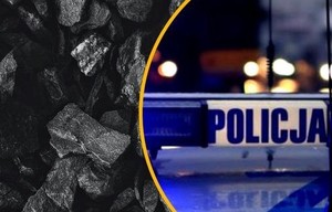 węgiel, obok radiowóz policji